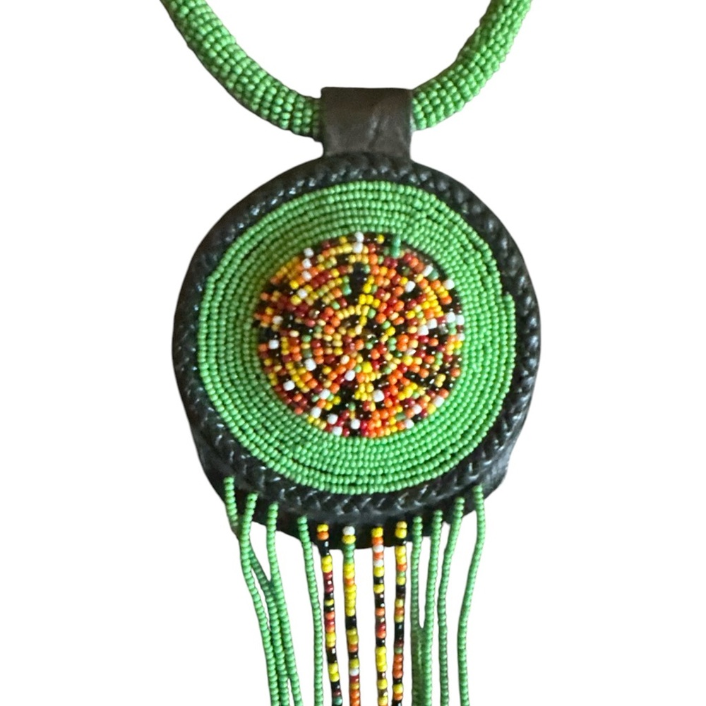 African handmade beat it necklace